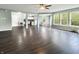 Open-concept living area with modern flooring and large windows offering ample natural light at 625 Streamside Dr, Greenfield, IN 46140