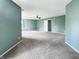 Large main bedroom with neutral carpet, recessed lighting, and ample closet space at 625 Streamside Dr, Greenfield, IN 46140