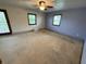 Bedroom with ample natural light and neutral-colored walls at 7140 N Michigan Rd, Fairland, IN 46126