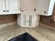 A kitchen detail shows granite countertops and a small white shuttered cabinet at 7140 N Michigan Rd, Fairland, IN 46126