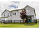 Charming fenced backyard featuring a well-maintained lawn and landscaping at 7218 Antiquity Dr, Carmel, IN 46033