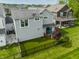 Aerial shot highlighting a backyard with artificial turf and a fence, providing a low-maintenance and secure outdoor area at 7218 Antiquity Dr, Carmel, IN 46033