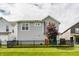 Fenced backyard features a lush lawn and beautiful landscaping providing a private outdoor space at 7218 Antiquity Dr, Carmel, IN 46033