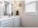 Bathroom vanity with granite countertops, modern fixtures, and towel rack at 7218 Antiquity Dr, Carmel, IN 46033