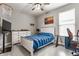 Bedroom showcasing a basketball hoop, desk, and dresser at 7218 Antiquity Dr, Carmel, IN 46033