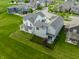 Backyard view featuring well-manicured lawn and fence, offering privacy and space for outdoor activities at 7218 Antiquity Dr, Carmel, IN 46033