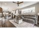 Spacious living room with kitchen view and lots of seating at 7218 Antiquity Dr, Carmel, IN 46033