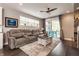 Comfortable living room area featuring plush seating and access to patio at 7218 Antiquity Dr, Carmel, IN 46033