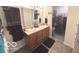 Bathroom featuring double sinks and a walk-in closet at 728 Jefferson Park Dr, Pittsboro, IN 46167