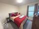 Cozy bedroom with neutral tones and a comfortable bed at 728 Jefferson Park Dr, Pittsboro, IN 46167