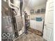 Functional laundry room with a washer, dryer, and ample storage space at 728 Jefferson Park Dr, Pittsboro, IN 46167