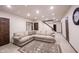Basement room with a sectional couch, recessed lighting, and finished flooring at 7626 Timber Springs S Dr, Fishers, IN 46038