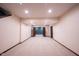 Spacious basement with neutral carpeting, perfect for storage or expansion at 7626 Timber Springs S Dr, Fishers, IN 46038