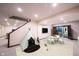 Finished basement area with play area and a TV mounted on the wall at 7626 Timber Springs S Dr, Fishers, IN 46038