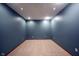Basement with blue-painted walls, neutral carpeting, and recessed lighting at 7626 Timber Springs S Dr, Fishers, IN 46038