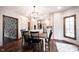 Eat-in kitchen with a large center island, stainless steel appliances, and modern light fixtures at 7626 Timber Springs S Dr, Fishers, IN 46038