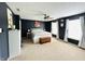 Lovely primary bedroom features a ceiling fan, natural light, and classic furniture at 7804 Amadeus Dr, Indianapolis, IN 46239
