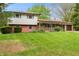 Charming two-story home with brick and vinyl siding and well-maintained lawn at 8140 Valley Estates Dr, Indianapolis, IN 46227