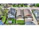 This aerial view highlights the backyard, wooden deck, and cozy neighborhood setting at 829 Olive St, Indianapolis, IN 46203