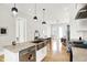 Modern kitchen featuring granite countertops, stainless steel appliances, and a stylish open design at 829 Olive St, Indianapolis, IN 46203