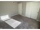 An empty bedroom features neutral-toned walls and sliding closet doors at 9074 Larson Dr, Pendleton, IN 46064