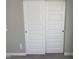 White bi-fold doors at 9074 Larson Dr, Pendleton, IN 46064