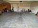 A spacious two car garage with ample room for parking and storage, perfect for a modern Gathering at 9074 Larson Dr, Pendleton, IN 46064
