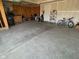 A spacious two car garage with ample room for parking and storage, perfect for a modern Gathering at 9074 Larson Dr, Pendleton, IN 46064