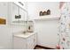 Bright bathroom with a white vanity and decorative accents at 9510 N Cooney Rd, Mooresville, IN 46158