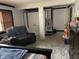 Bedroom featuring a plush recliner, playful toys, and ample storage space, exuding comfort and functionality at 9510 N Cooney Rd, Mooresville, IN 46158