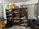 Bonus room with a large bookcase and plenty of open storage and display space at 9510 N Cooney Rd, Mooresville, IN 46158