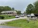 Inviting home with a long driveway and storage buildings, offering both comfort and convenience at 9510 N Cooney Rd, Mooresville, IN 46158