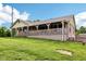 Exterior home with porch and side awning at 9510 N Cooney Rd, Mooresville, IN 46158