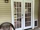 French doors with pet door, leading to the exterior at 9510 N Cooney Rd, Mooresville, IN 46158