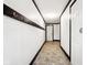 A well-lit hallway leads to various rooms in the home at 9510 N Cooney Rd, Mooresville, IN 46158