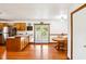 Eat-in kitchen featuring French doors and hardwood floors and breakfast bar at 9510 N Cooney Rd, Mooresville, IN 46158