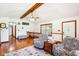 Bright living room with hardwood floors, natural light, and comfortable armchairs at 9510 N Cooney Rd, Mooresville, IN 46158
