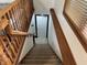 Stairway with wooden banister leading to the next level at 9510 N Cooney Rd, Mooresville, IN 46158