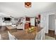 Open concept dining area flowing into living room and kitchen, great for entertaining guests at 9557 W Lantern Ln, Pendleton, IN 46064