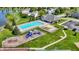 Community pool and playground are surrounded by green space, near the lake at 9557 W Lantern Ln, Pendleton, IN 46064