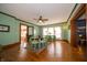 Charming dining room features hardwood floors, natural lighting, and view into additional rooms at 9579 N Fortville Pike, Fortville, IN 46040