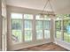 Charming breakfast nook featuring hardwood floors, windows offering lots of natural light, and a chandelier at 9909 E Mcgregor Rd, Indianapolis, IN 46259