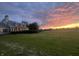 Stately home with large lawn and beautiful sunset views at 9909 E Mcgregor Rd, Indianapolis, IN 46259