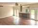 Living room with hardwood floors, fireplace and double doors at 9909 E Mcgregor Rd, Indianapolis, IN 46259