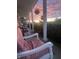 Cozy front porch with chairs and sunset views at 9909 E Mcgregor Rd, Indianapolis, IN 46259