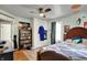 Bedroom featuring a ceiling fan, large wardrobe, and a comfortable bed at 1000 E King St, Franklin, IN 46131