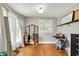 Bright bedroom featuring hardwood floors, natural light, and a classic vanity at 1000 E King St, Franklin, IN 46131