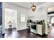 This classic kitchen features stainless steel appliances and hardwood floors at 1000 E King St, Franklin, IN 46131
