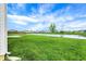 Backyard view of the neighborhood pond at 10236 Arctic Edge Dr, Indianapolis, IN 46239