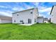 A well-manicured lawn and a patio area for outdoor entertaining at 10236 Arctic Edge Dr, Indianapolis, IN 46239